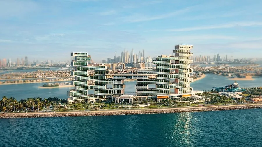 Atlantis The Royal on Dubai's Palm Jumeirah, with the city skyline behind
