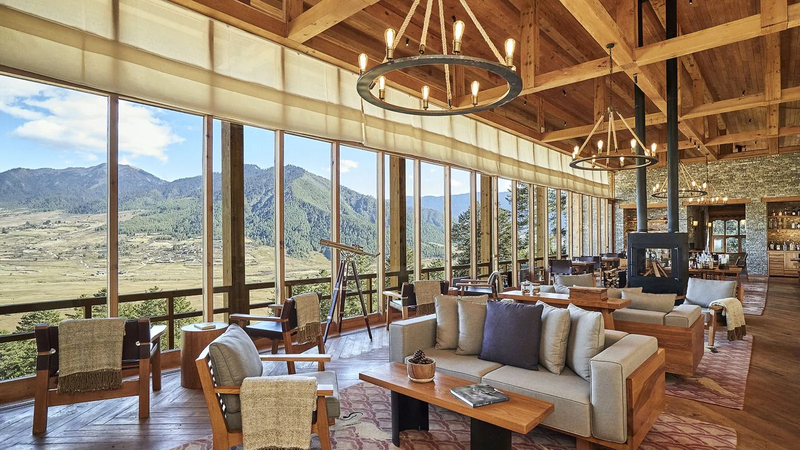 Timber, stone and floor-to-ceiling valley views.