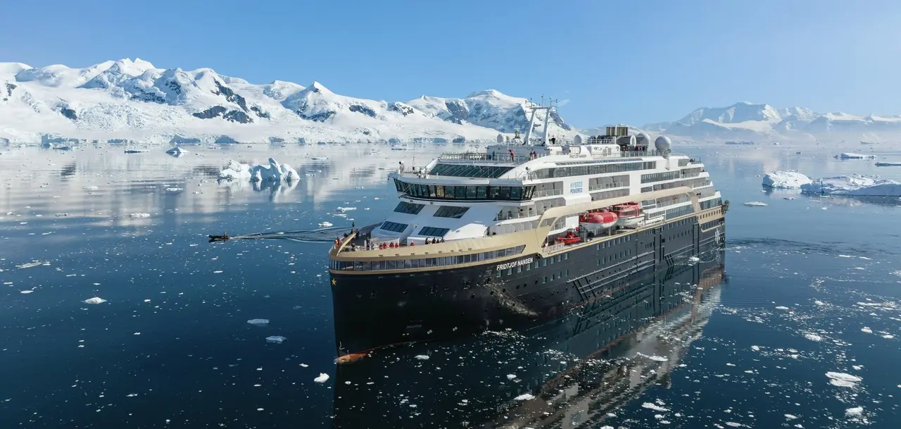 A HX Expeditions ship at sea
