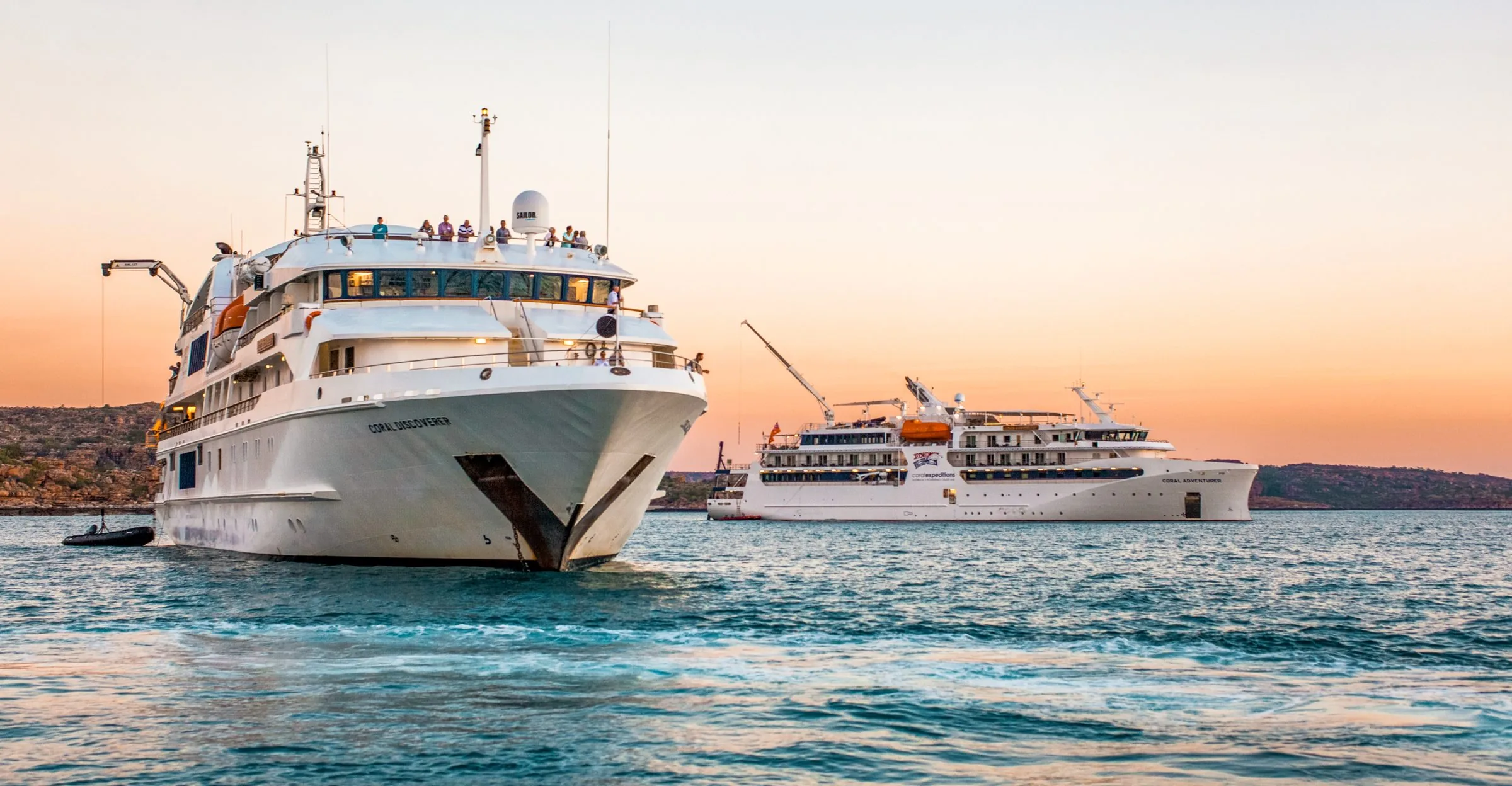 Coral Discoverer and Coral Adventurer at anchor in the Kimberley at sunset