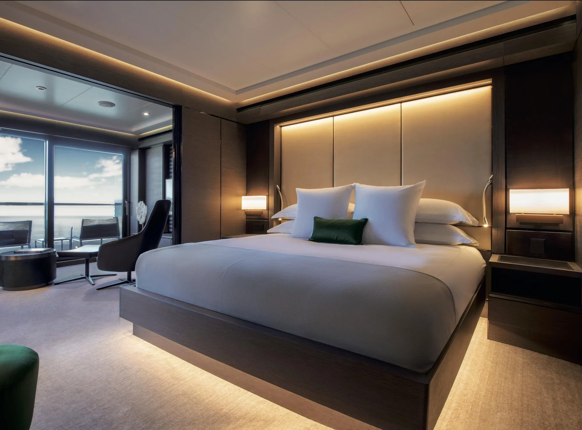 A suite aboard The Ritz-Carlton Yacht Collection, with its private terrace beyond