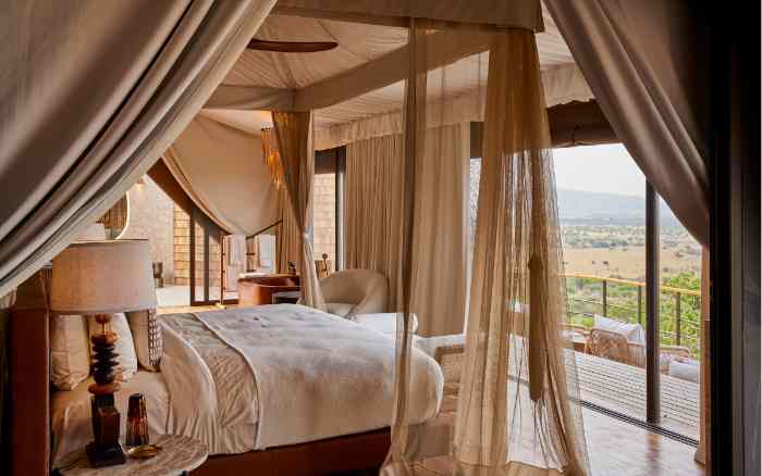 Suite bedroom at Grumeti Art Lodge, western Serengeti