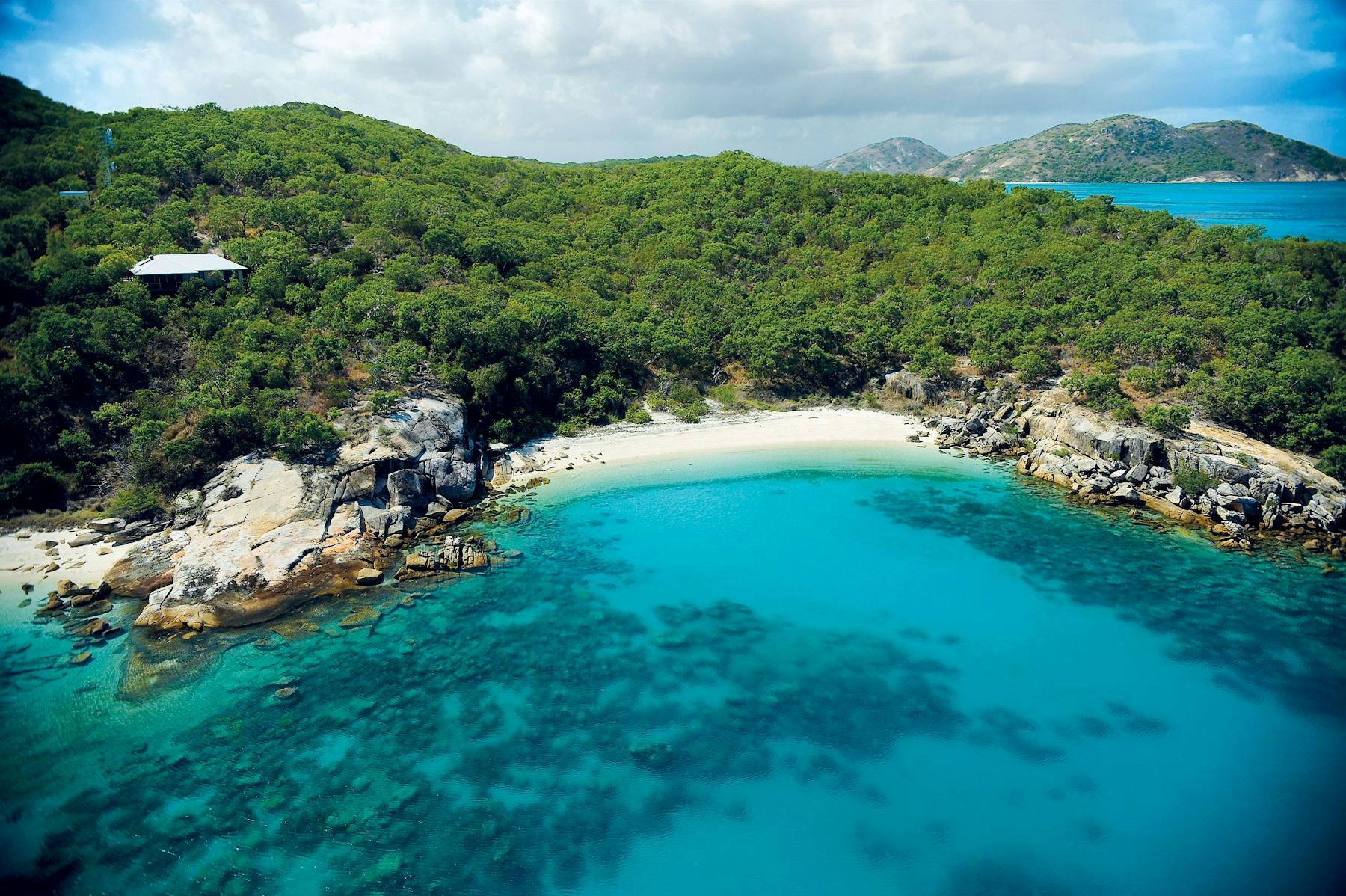 Snorkelling coral gardens straight off the beach