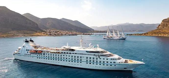 A Windstar ship and sailing yacht off a Greek coast