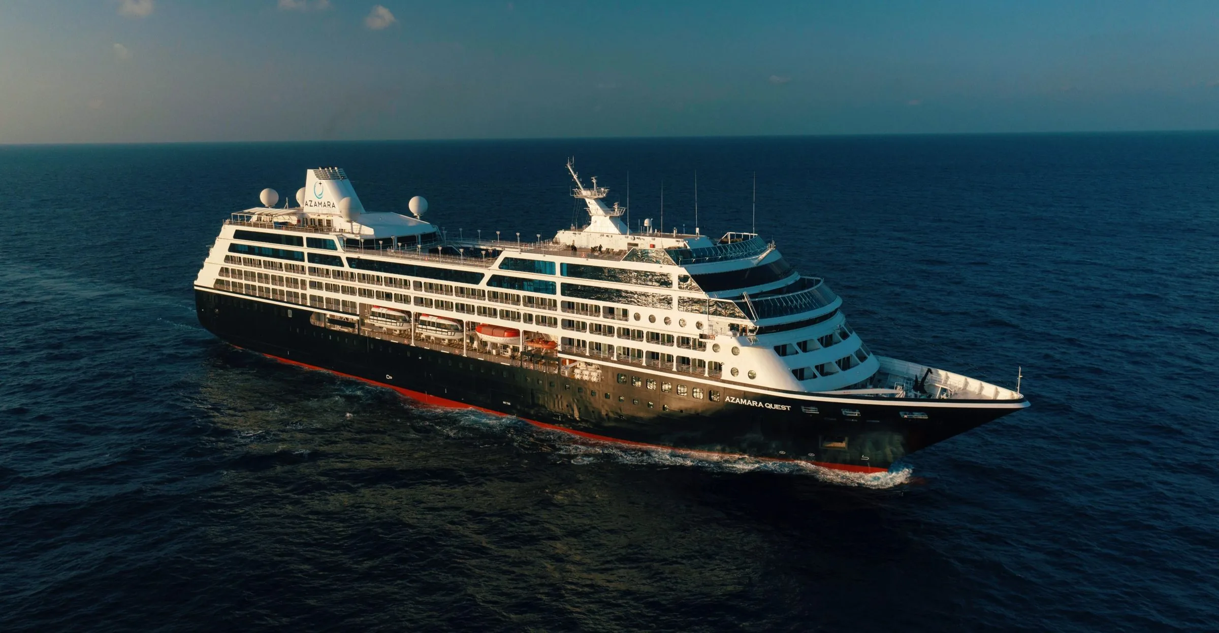 Azamara Quest cruising the open sea in late-afternoon light