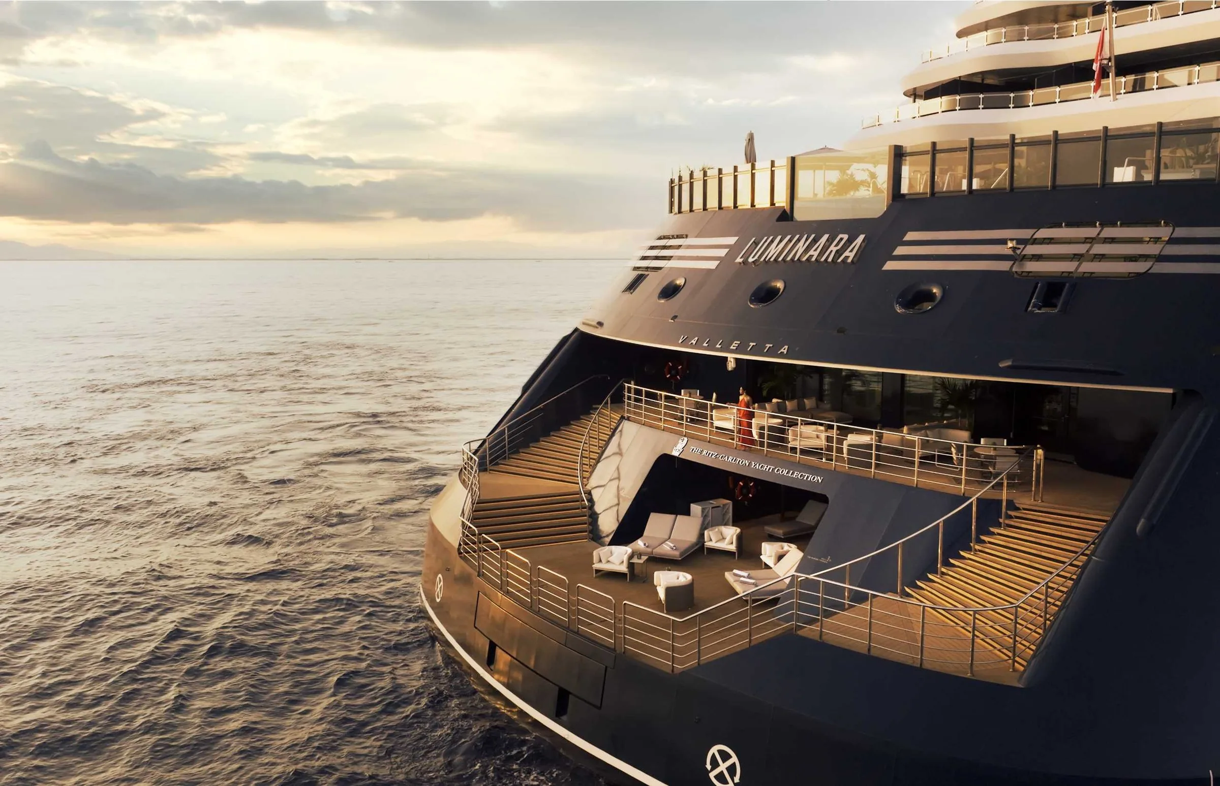 The stern of Luminara, The Ritz-Carlton Yacht Collection, at sunset