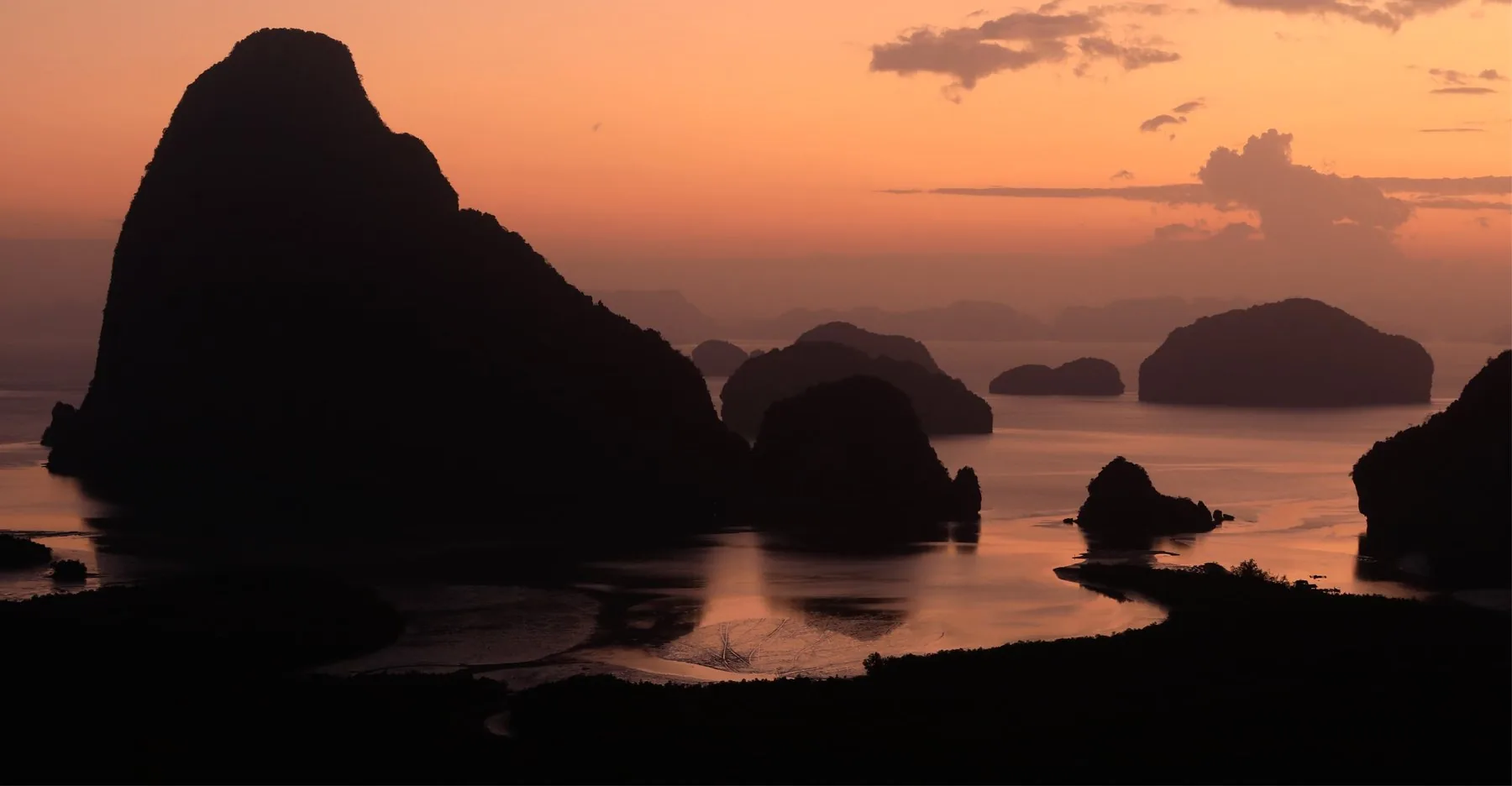 Limestone islands at sunset in Thailand's Phang Nga Bay