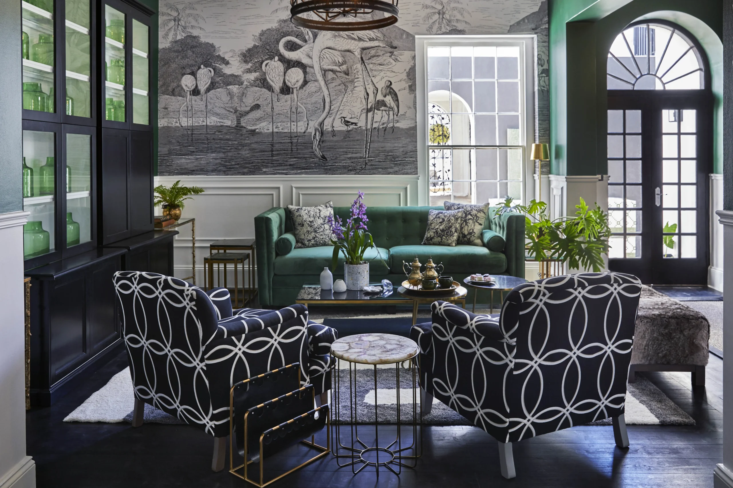 A layered, art-filled sitting room at Cape Cadogan